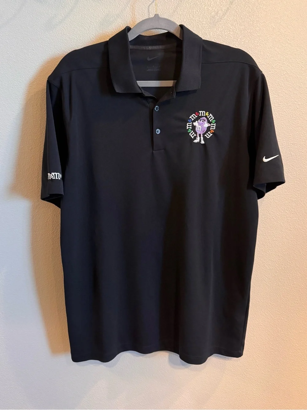 Nike Black Short-Sleeve Polo with Embroidered Purple M&M Character